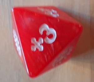 Le dé élémentaire de feu sur une face +3