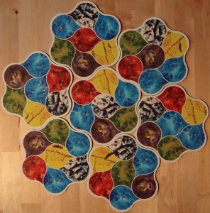 Les 7 tuiles continent de la boîte